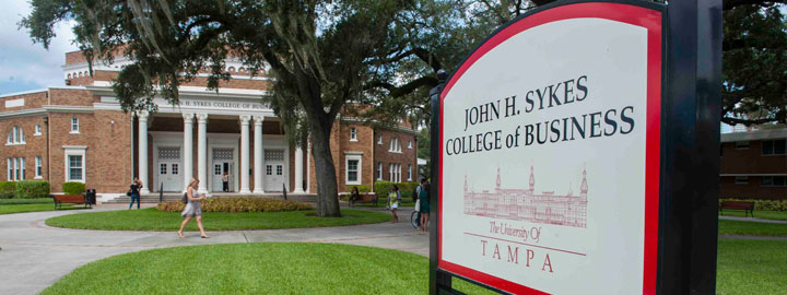 John H. Sykes College of Business Sign 