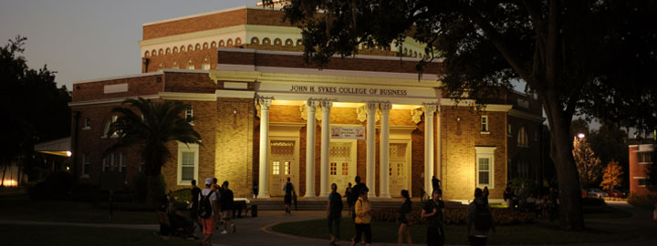 Sykes College of Business at night