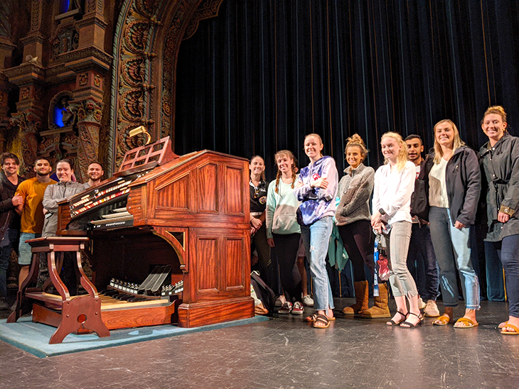 Students in Management 431: Practical Strategic Assessment take a tour of the Tampa Theatre.