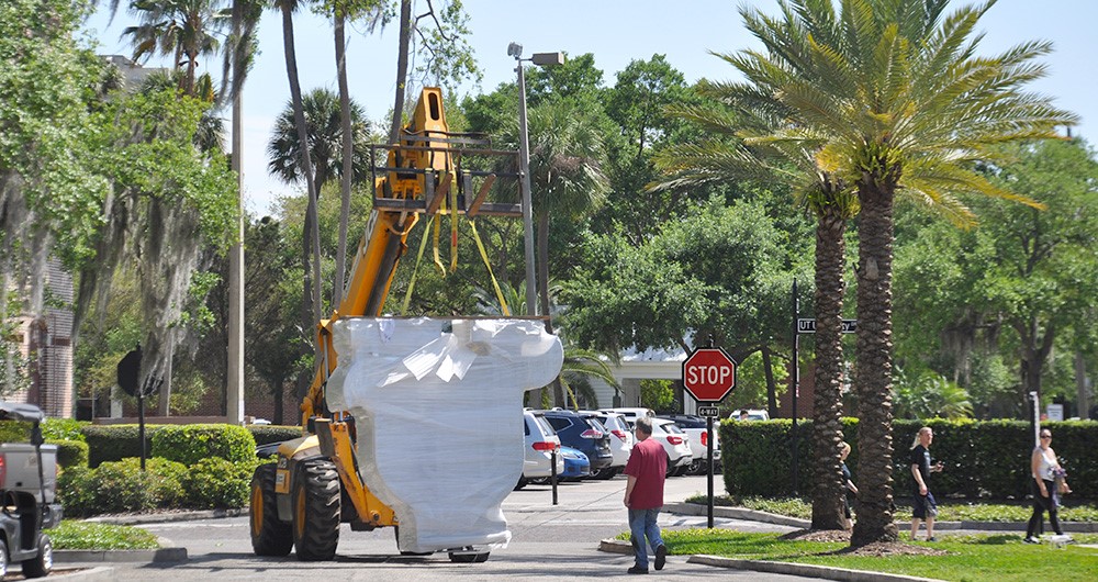 A construction truck carries a UT sign.