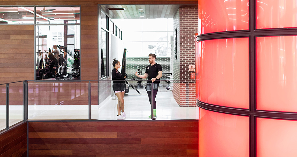 Students hanging out in the Riseman Fitness and Recreation Center