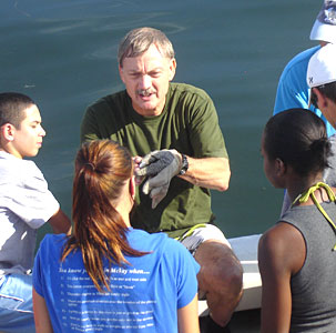 Professor teaching students outside of the classroom