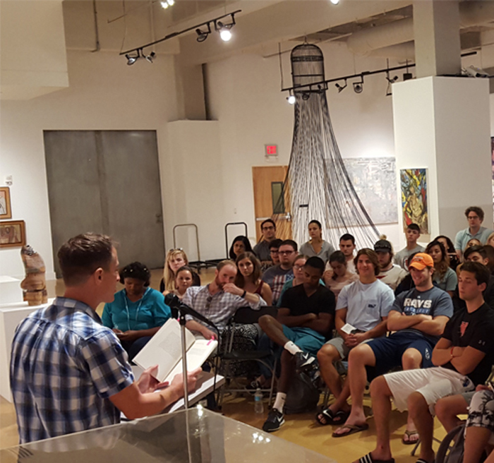 Students listening to a speaker 