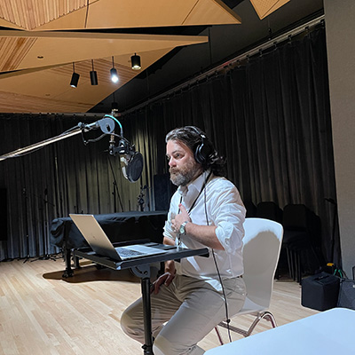 Clay Risen taping her recording