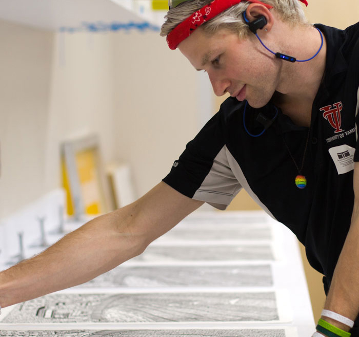 artist working on prints