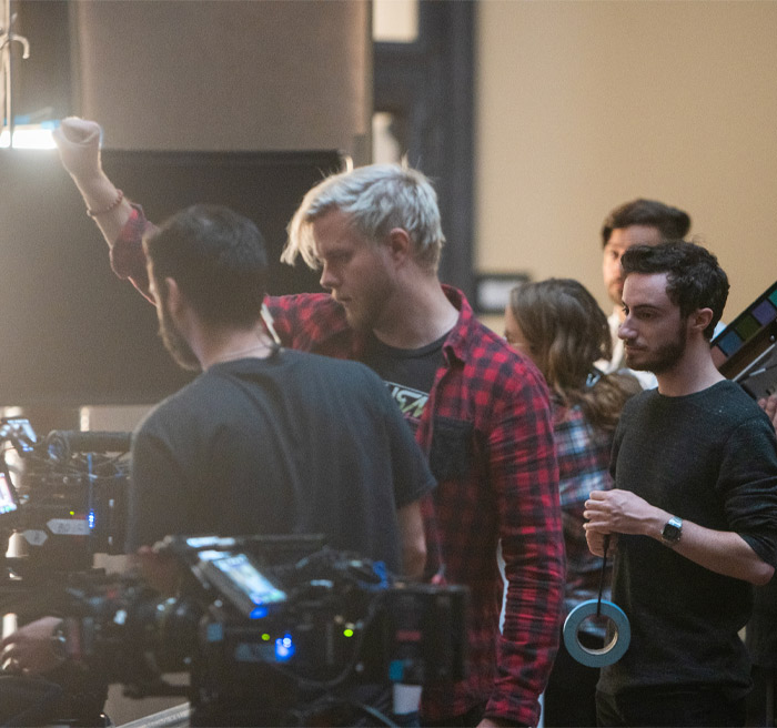 students filming movie 