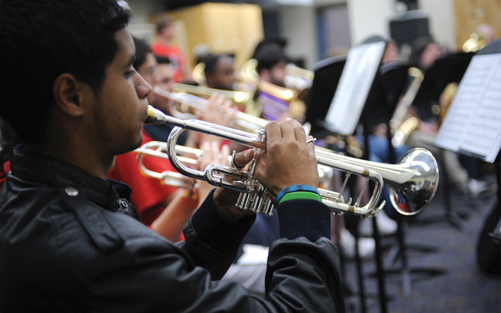 Student playing the trumpet Student playing the trumpet