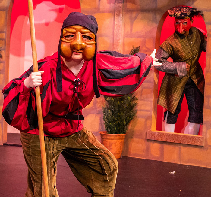 Student performing in a play