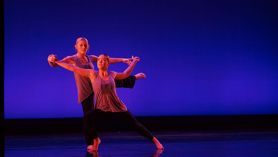 Students performing in a dance ensemble.
