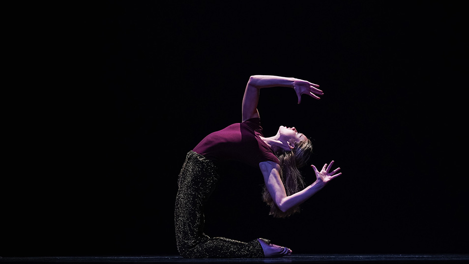 Student performing in a dance ensemble.