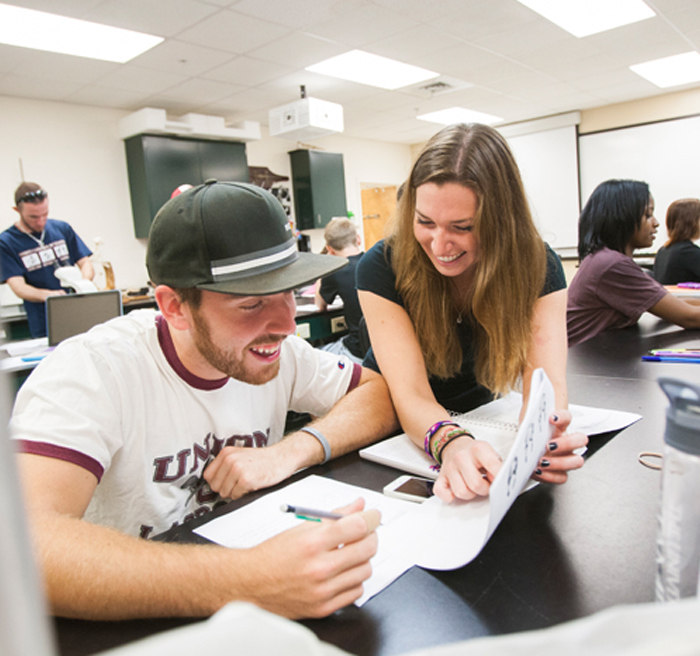 professor and student in classroom professor and student in classroom