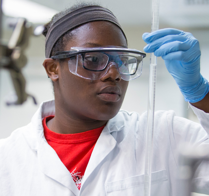 student working on experiment student working on experiment