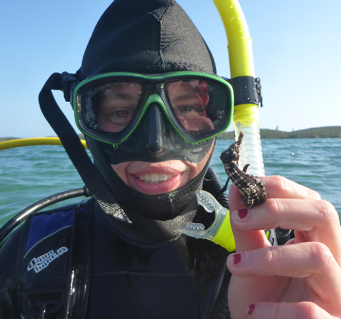 Student in diving gear Student in diving gear