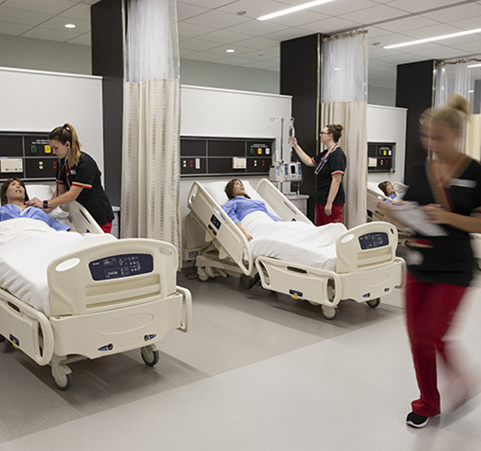 nurses practicing in lab