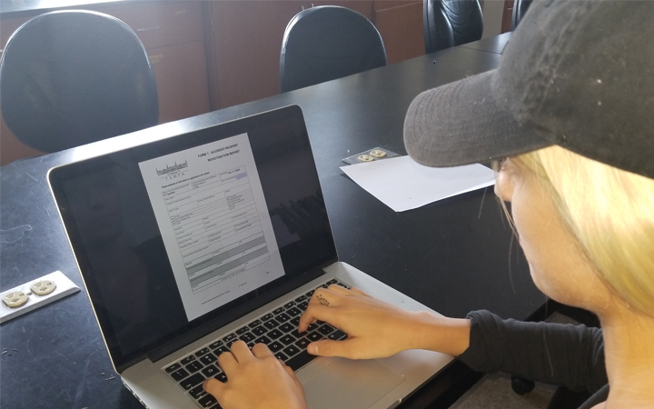  Student filling out an incident report