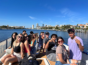 Students on a boat tour of the Hillsborough River and downtown Tampa.