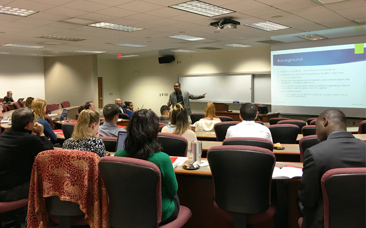 Faculty research symposium in COB.