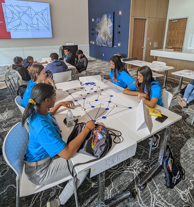 CyberSpartans working on an assignment