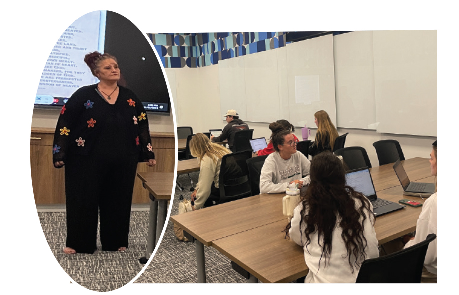  A WOMAN DRESSED IN BLACK STANDS IN FRONT OF A ROOM