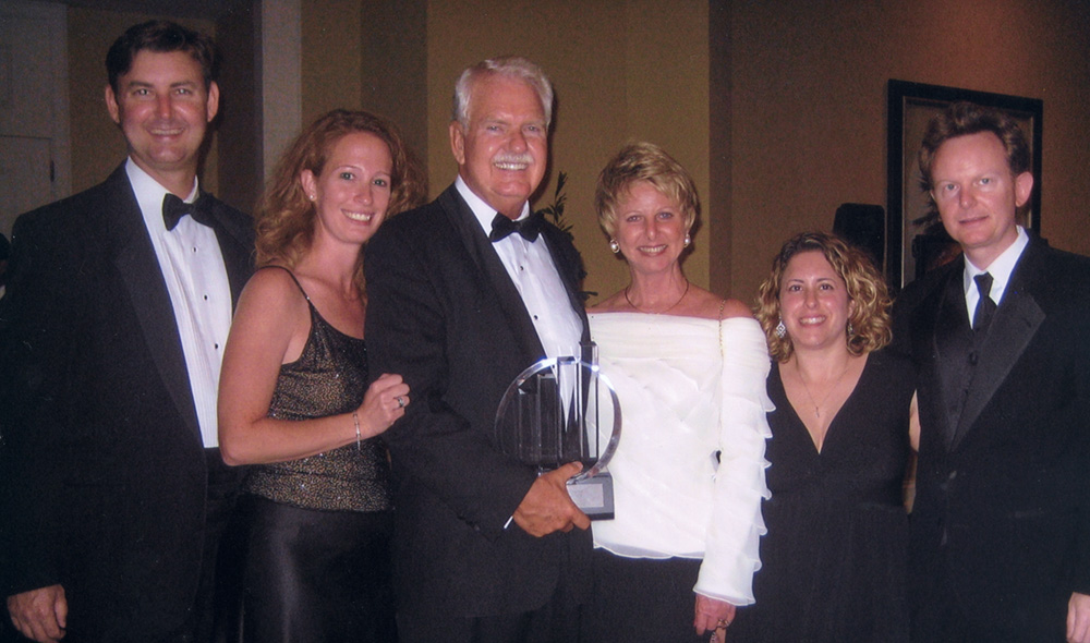 Dr. Stephen F. and Marsha Dickey are pictured at center, with Jason Dickey MBA ’03 and his wife, Stacie, on the left, and Chris Dickey and his wife, Cristina, on the right.