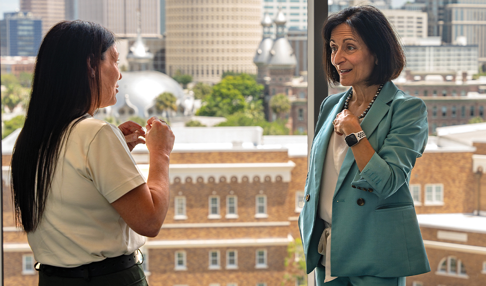 Two woman talking