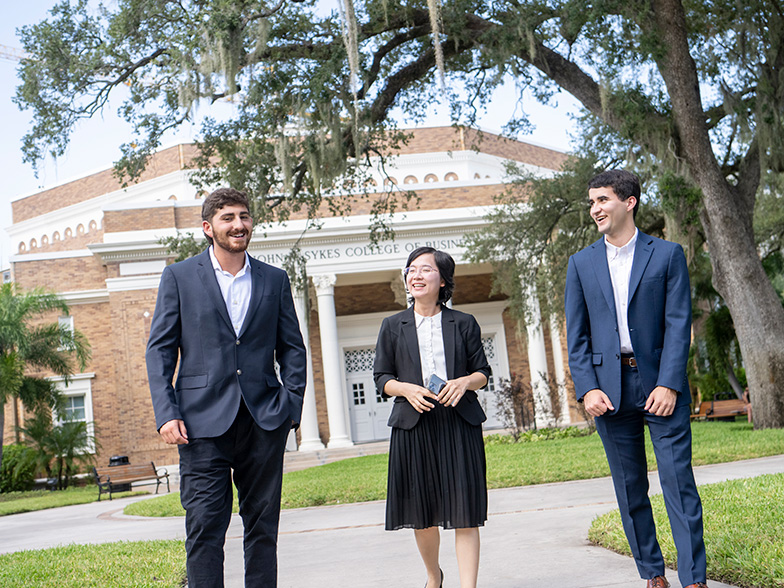 Students walking and talking about their internships.