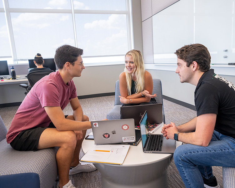 Students in the Spartan Accelerator working on a project.