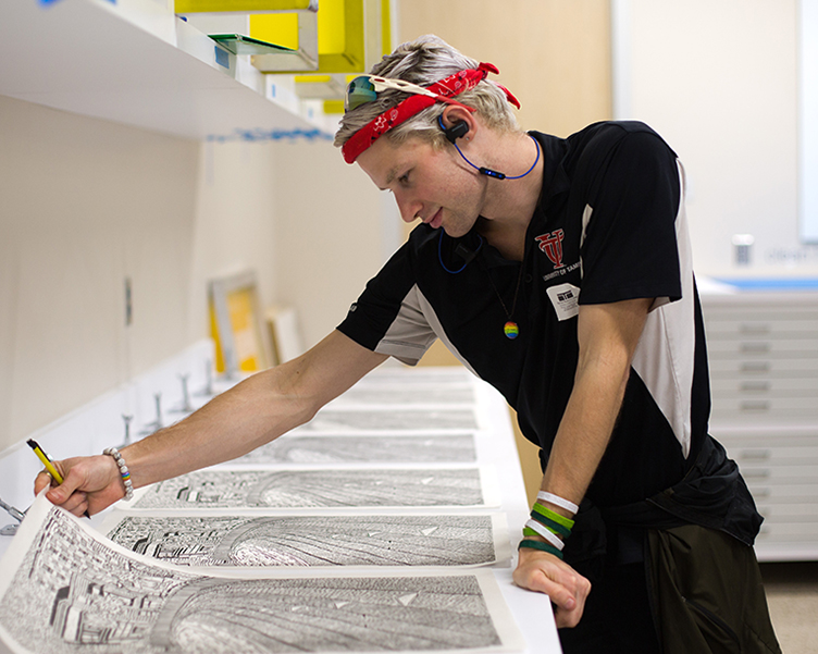 Student in printshop