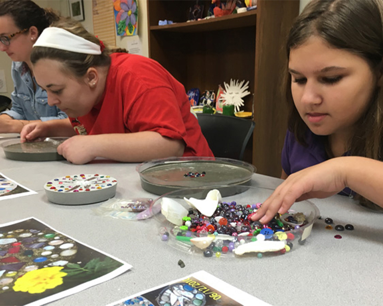 Students making mosaics