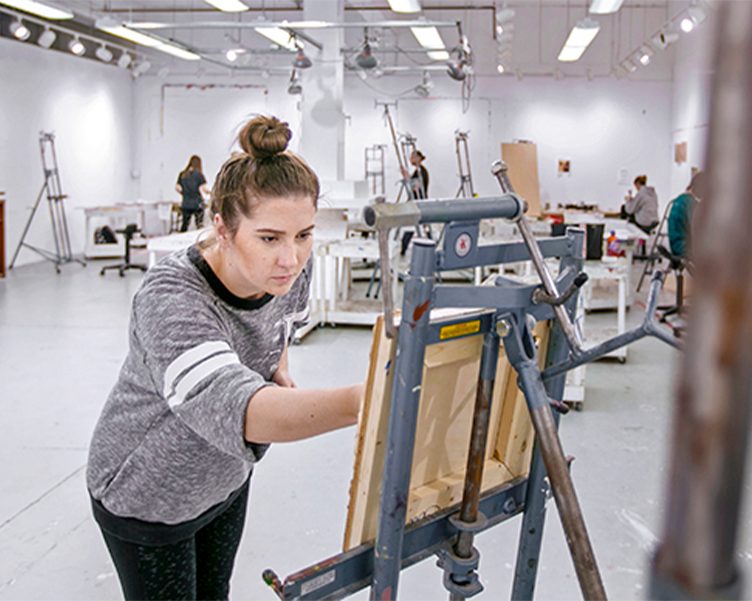 Student painting in the art studio