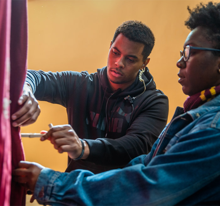 students working on movie set 