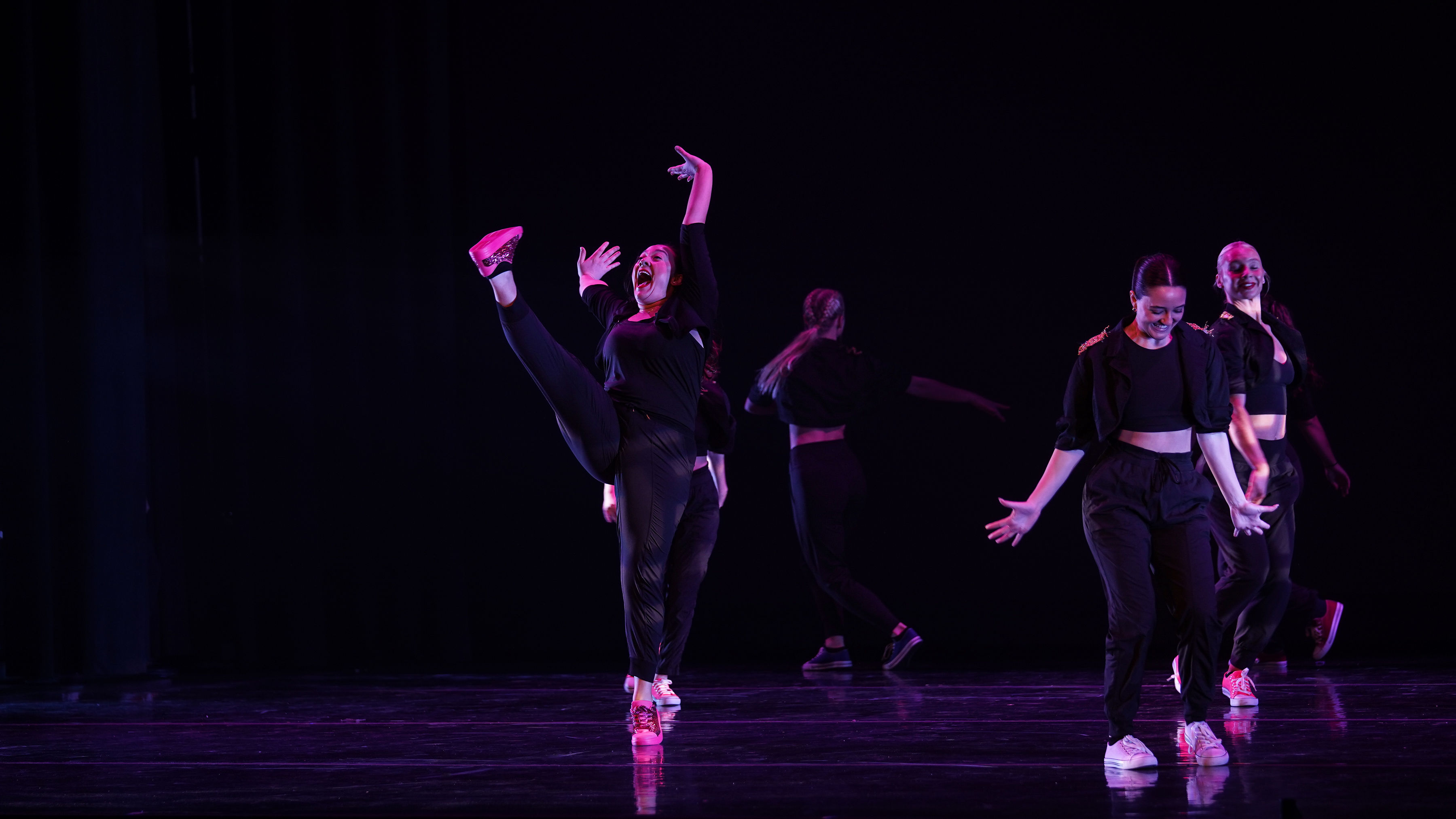 Students performing in a dance ensemble