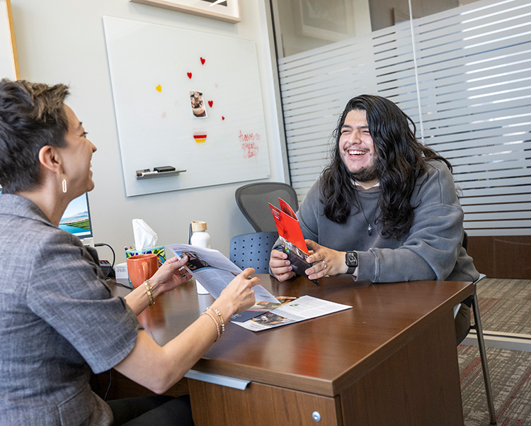 UTampa Cares staff helping students.