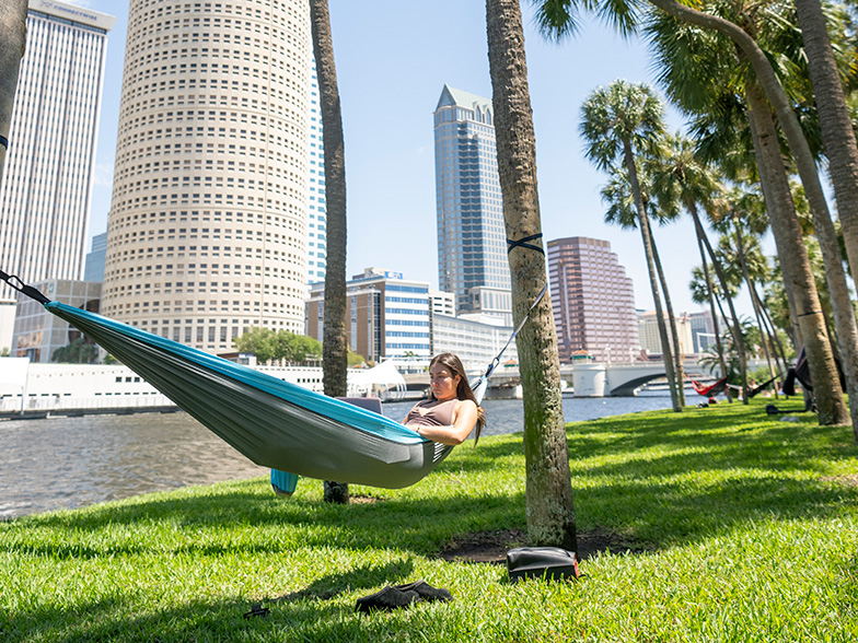 Student in hammock in Plant Park
