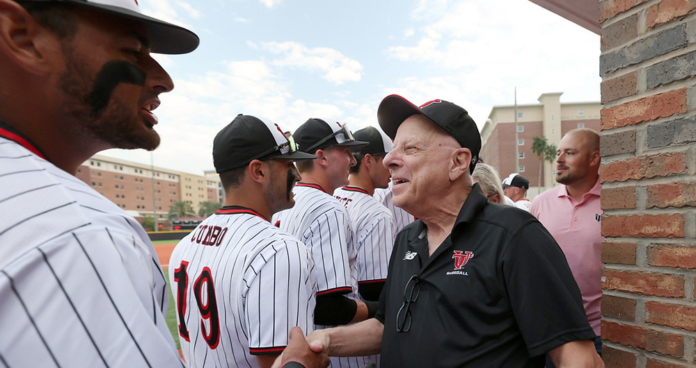 People at a ribbon cutting ceremony