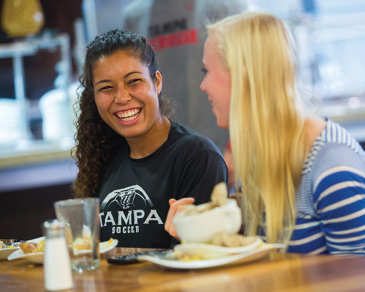 Students eating together. 