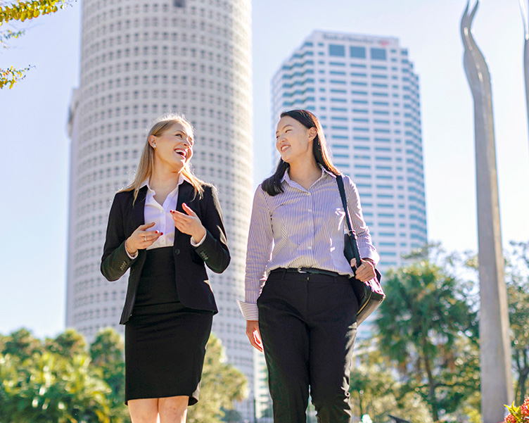 UT students walking together on campus