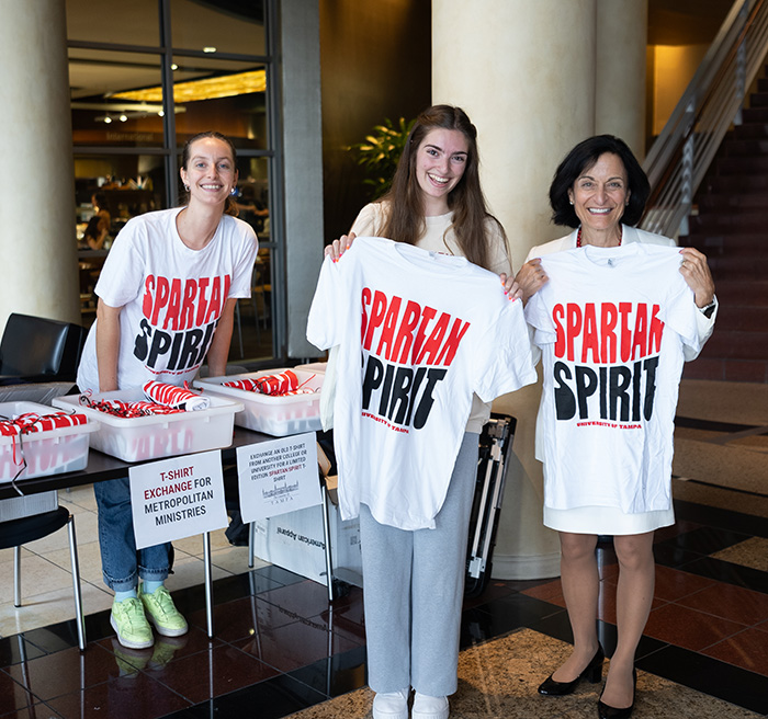 President Dahlberg participating it the T-shirt exchange.