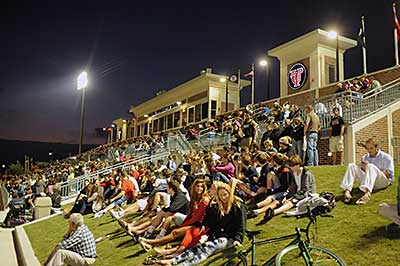 People attending a lacrosse game