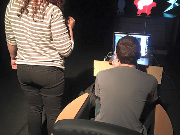 Two students working in a studio 