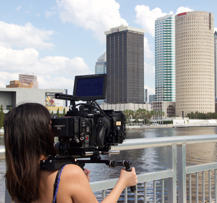 Student filming downtown 