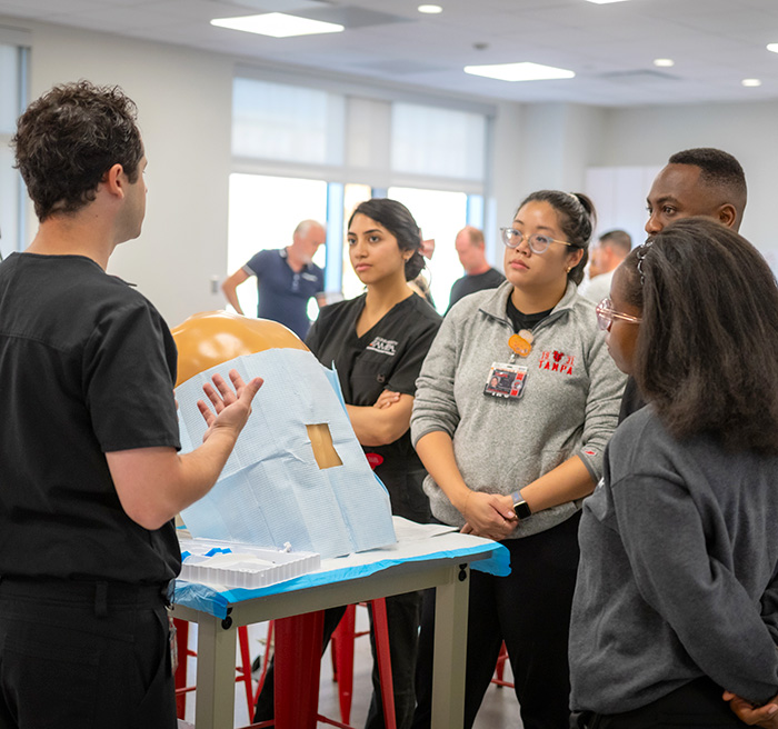 People practicing CPR