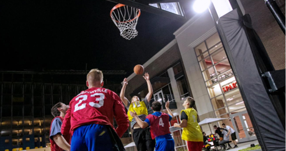 students playing basketball