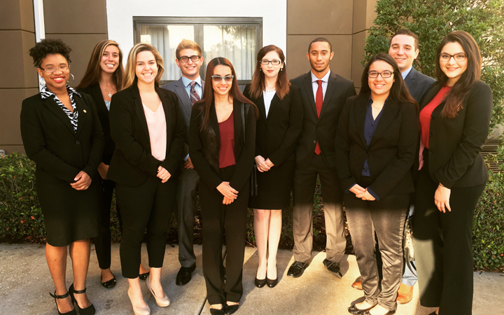 Group of students in business suits