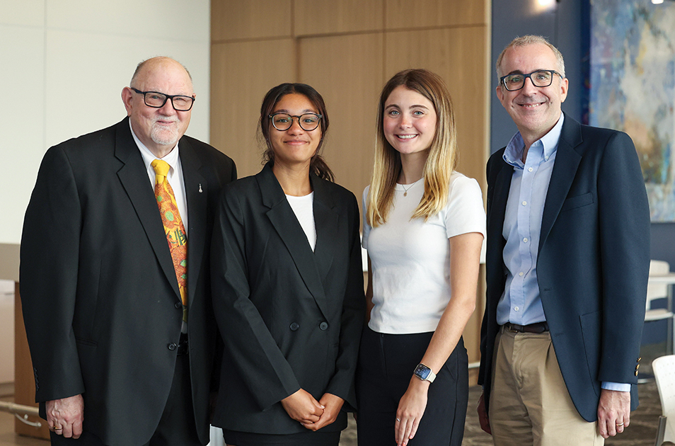 The Drs. Janet and Lee Matthews Psychology Award is given to outstanding psychology  students. Dhani Deveaux ’23, second from left, won for 2022-2023, and Stacey Hoffmeister ’25, third from left, received the award for the 2023-2024 school year