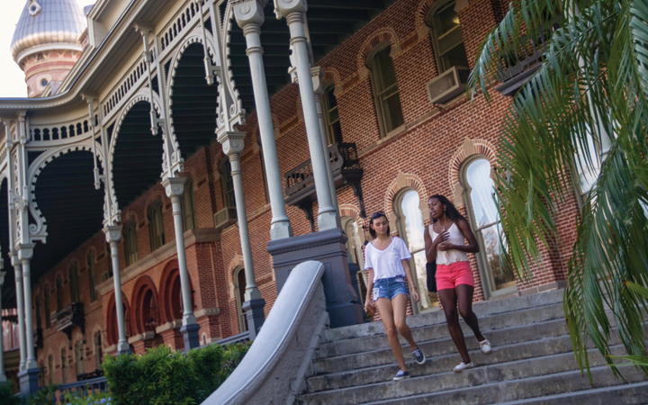 Students walking down stairs 