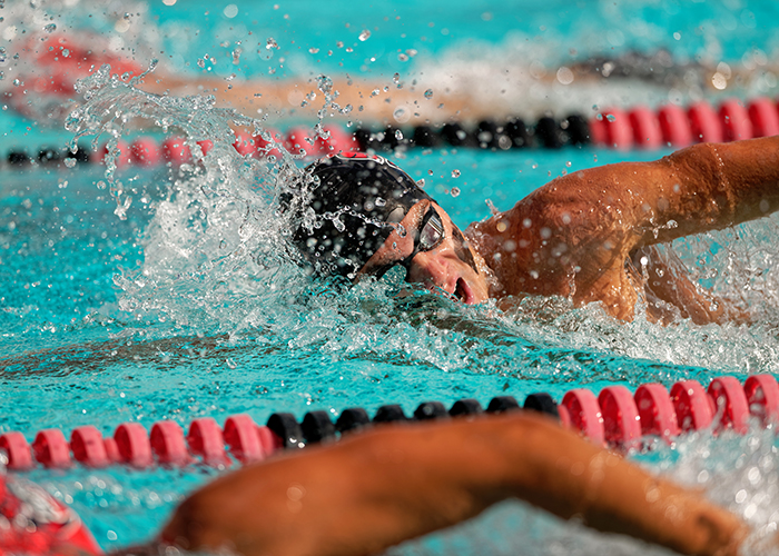 Men's swim team in the pool