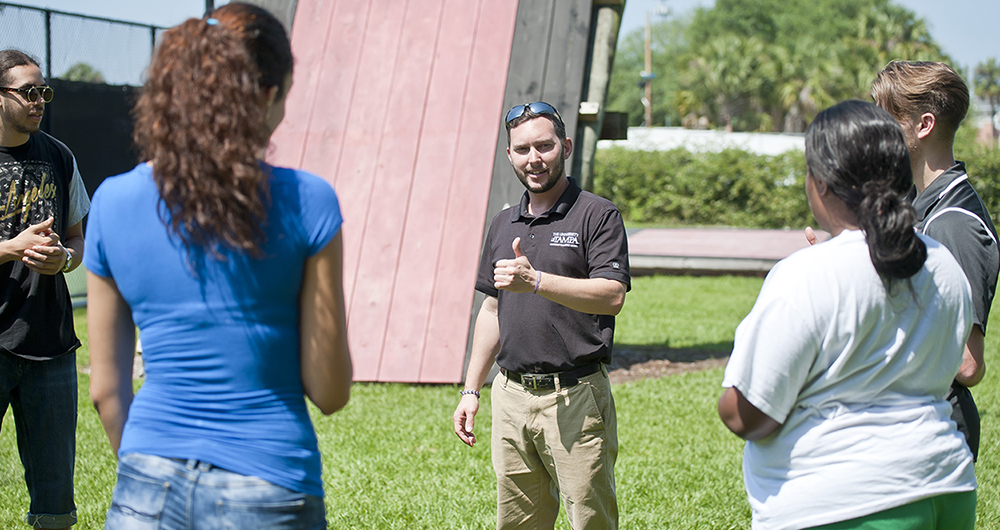 Students participating in the leadership challenge course