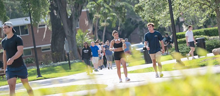 students walking across campus