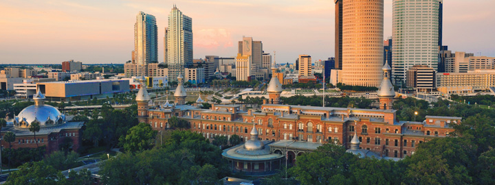 Campus with downtown buildings in the background